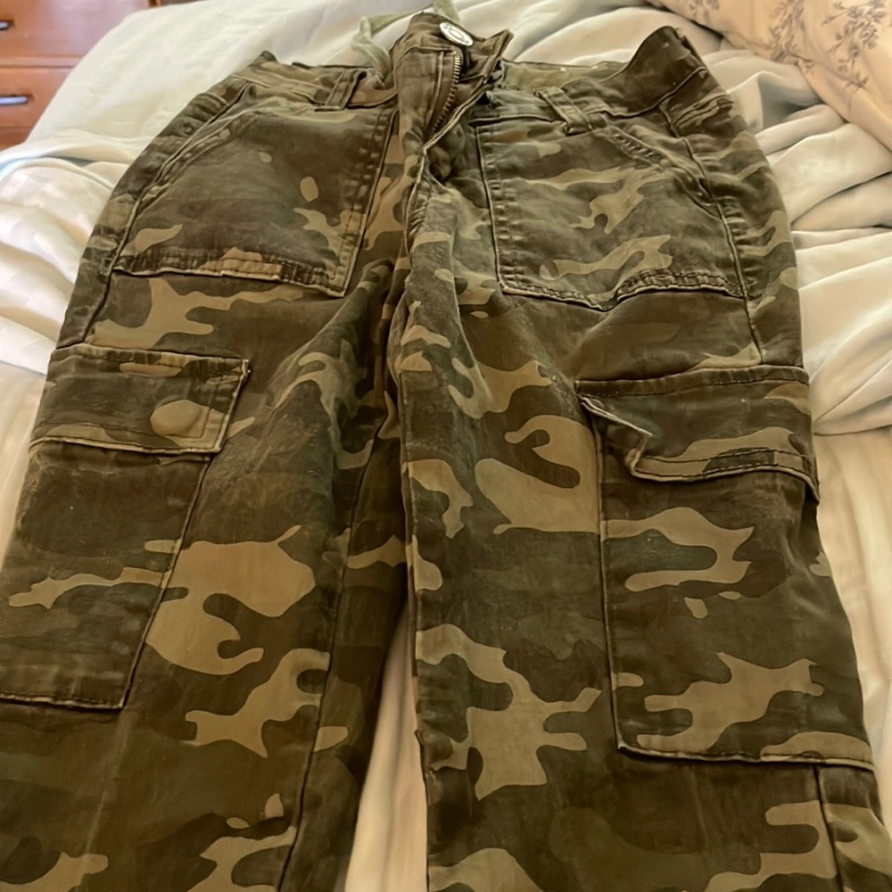 Rue 21 Jean type material cargo pants .